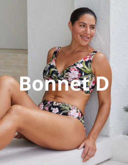 Femme portant un bikini bonnet D avec imprim&eacute; tropical de la marque Artesands.